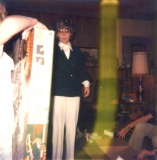 Mom Watching Over Christmas Gift Opening