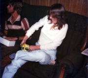 Roger with Debbie Struggling with Gift