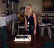 Jenna Cutting Graduation Cake