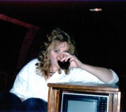 Mindy Drinking in Limo