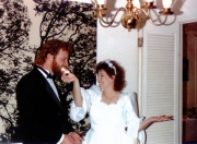 Terry & Gail Eating Wedding Cake