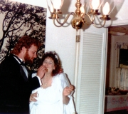 Terry & Gail Eating Wedding Cake